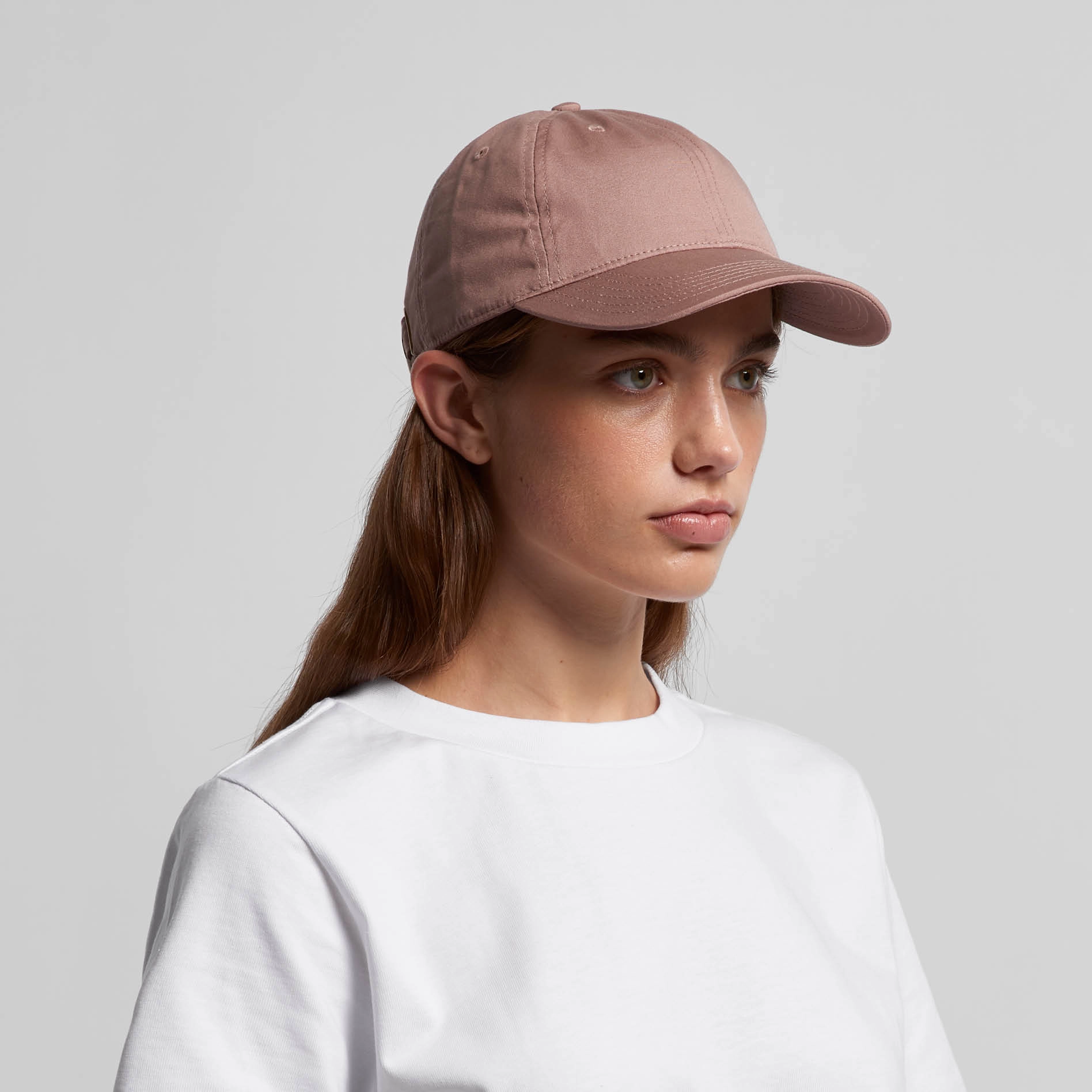 Lady wearing a pink cap