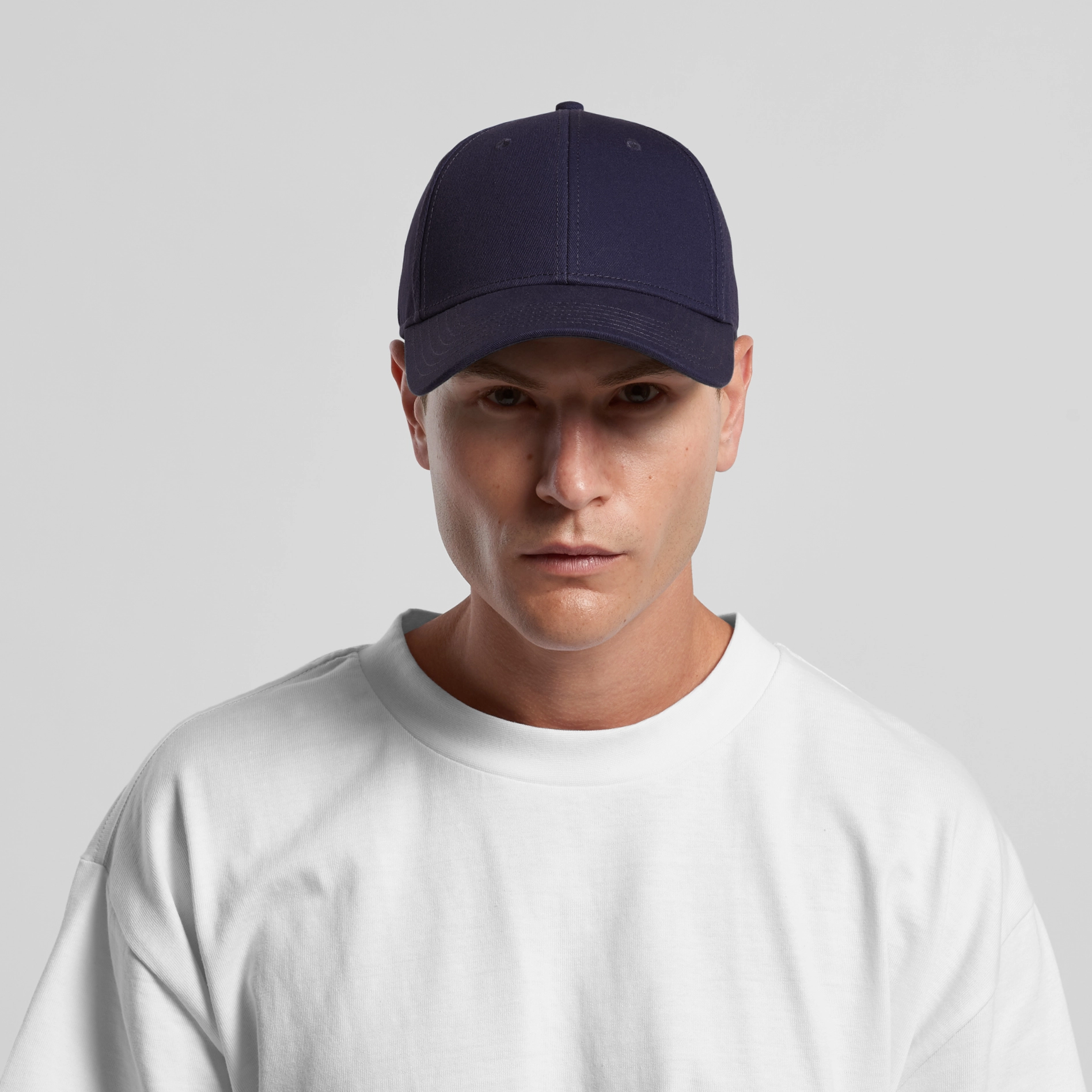 Man wearing black cap for logo printing