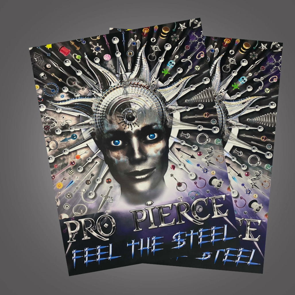 An A2 poster with a chrome face in the middle surrounded by piercings. The text 'Pro Pierce Feel The Steel' is at the bottom