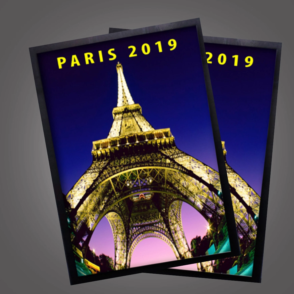 Eiffel tower lit up at night taken from the ground with the text PARIS 2019 printed on a BackLit Light Box Poster