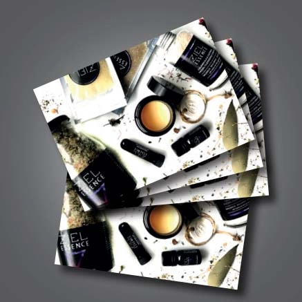 A6 Postcards An A6, portrait postcard template with large scissors in the background and placeholders for details about a hair salon