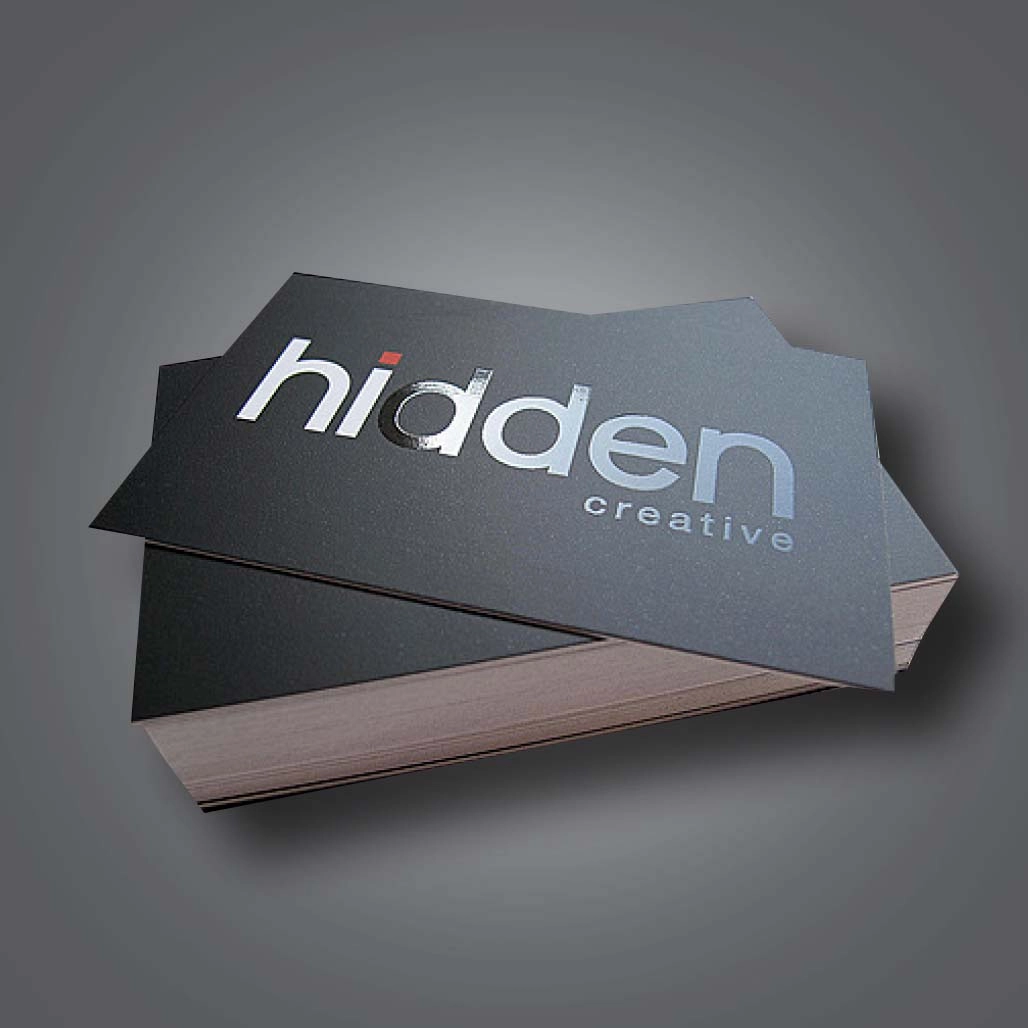 Stack of black premium business cards with the text hidden