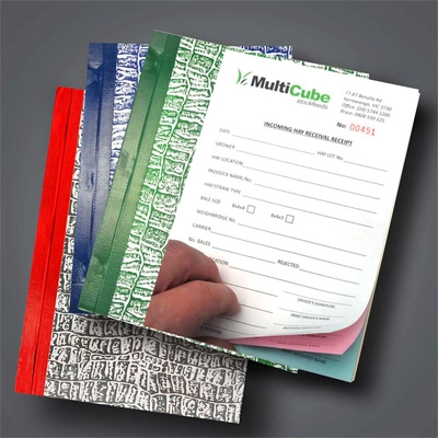 A docket book for receipts showing a full colour logo for MultiCube stockfeeds
